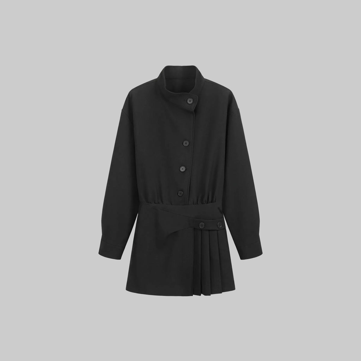 Model wearing the Celeste black belted shirt mini dress with long sleeves, button-front detailing, and a pleated mini skirt.
