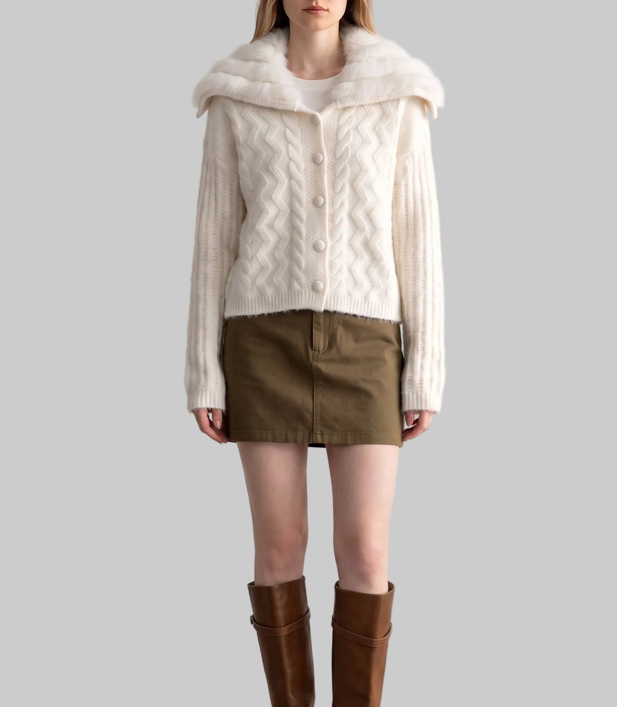 Model wearing the Colette ivory fur collar knit cardigan, front view