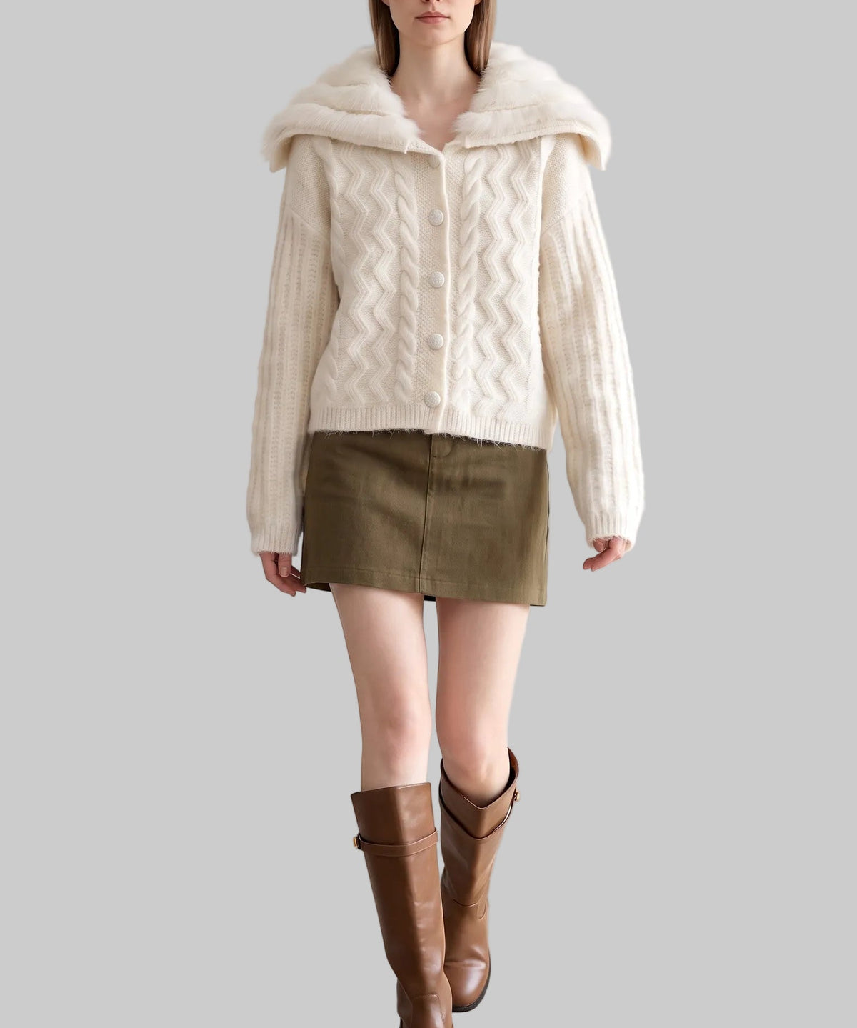 Model wearing the Colette ivory fur collar knit cardigan, front view