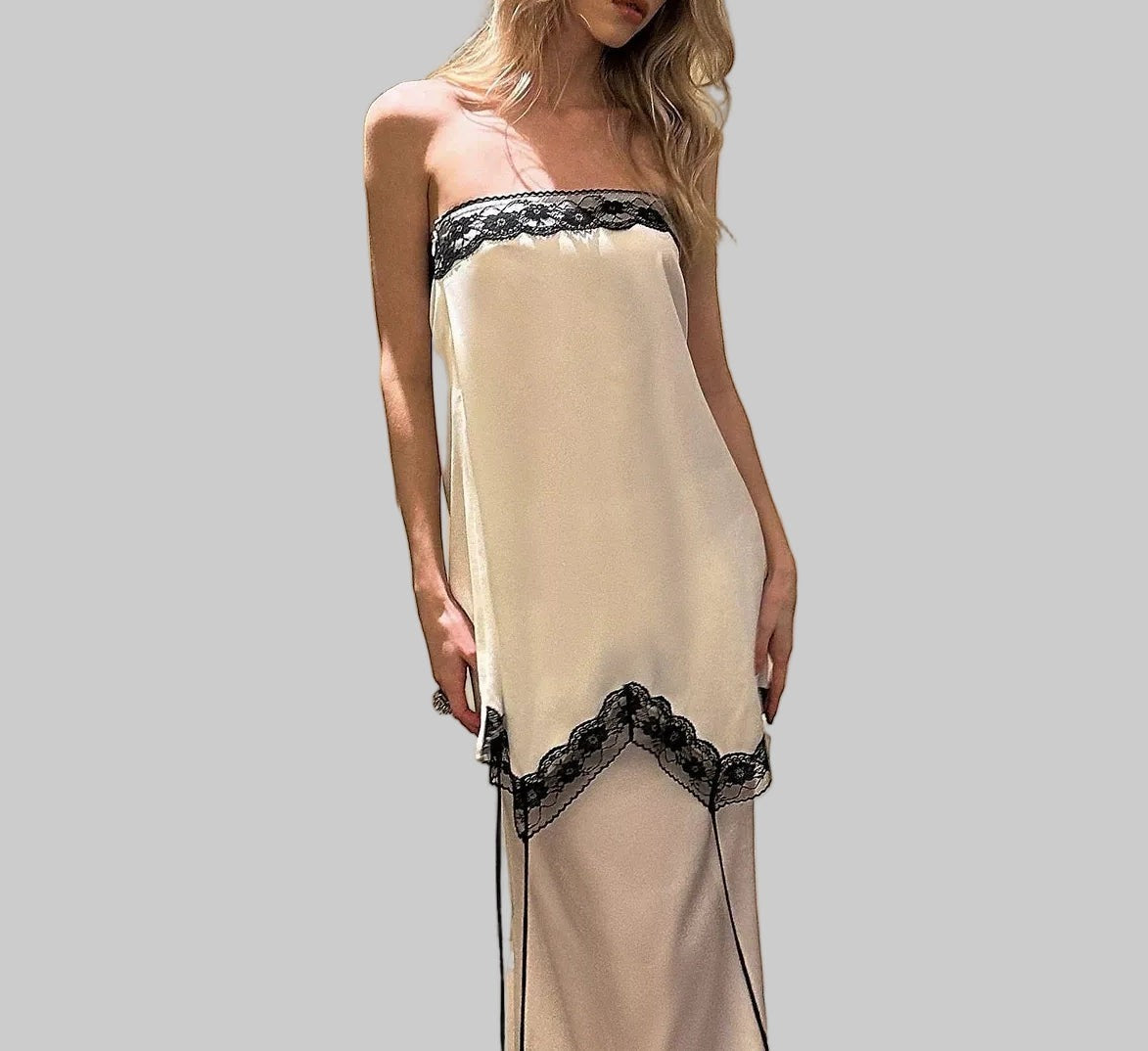 LUNRIA Deconstructed Satin Camisole with Scalloped Lace Trim, pale champagne satin with black lace trim, asymmetric drape, thin straps.