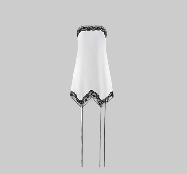LUNRIA Deconstructed Satin Camisole with Scalloped Lace Trim, white satin with black lace, asymmetric drape, thin tie straps.