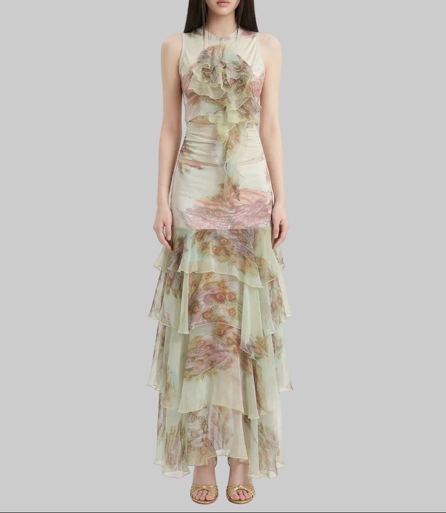 LUNRIA floral asymmetric sleeveless top featuring layered chiffon ruffles, a waist cutout, and a soft pastel print.