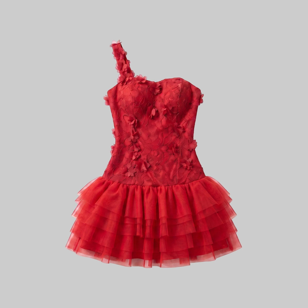 A red one-shoulder mini dress featuring a textured, floral-embroidered corset bodice and a layered tulle ruffled skirt, shown flat on a white background.