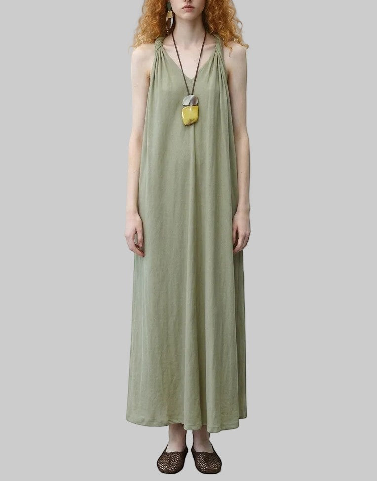 LUNRIA Sage green halter backless maxi dress with tie-dye scarf tie detail. Flowy A-line silhouette for resort wear.