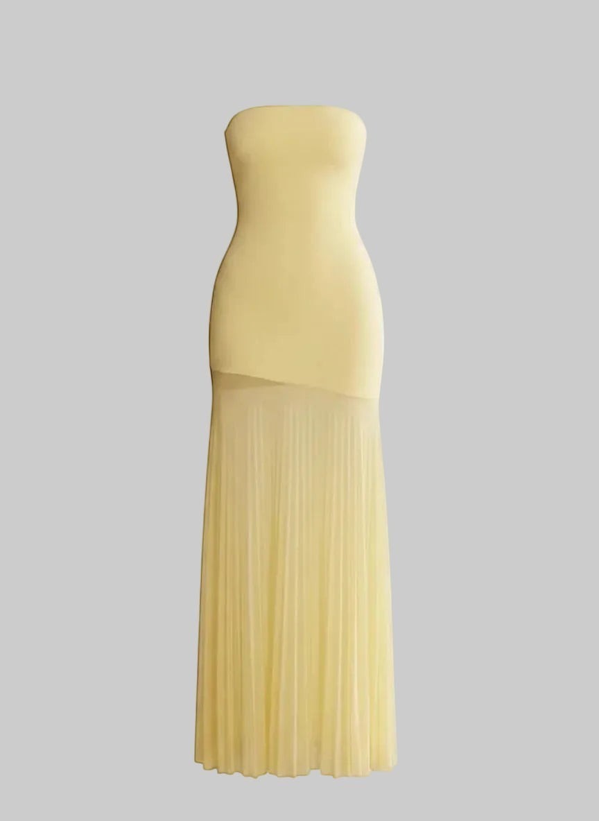 LUNRIA yellow strapless maxi dress featuring a fitted bodice and a sheer pleated floor-length skirt with an asymmetric hem.