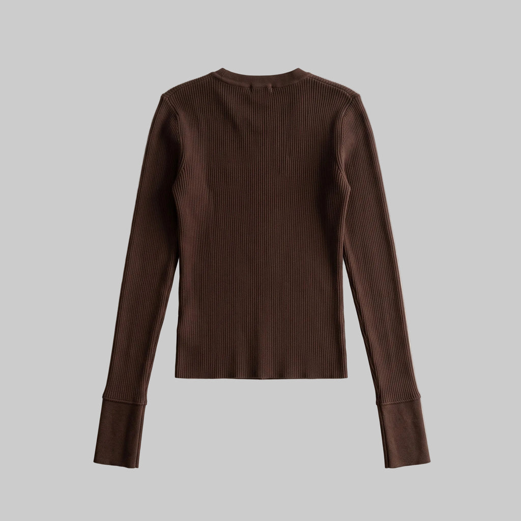 Model wearing the Sienna chocolate brown asymmetric button knit top