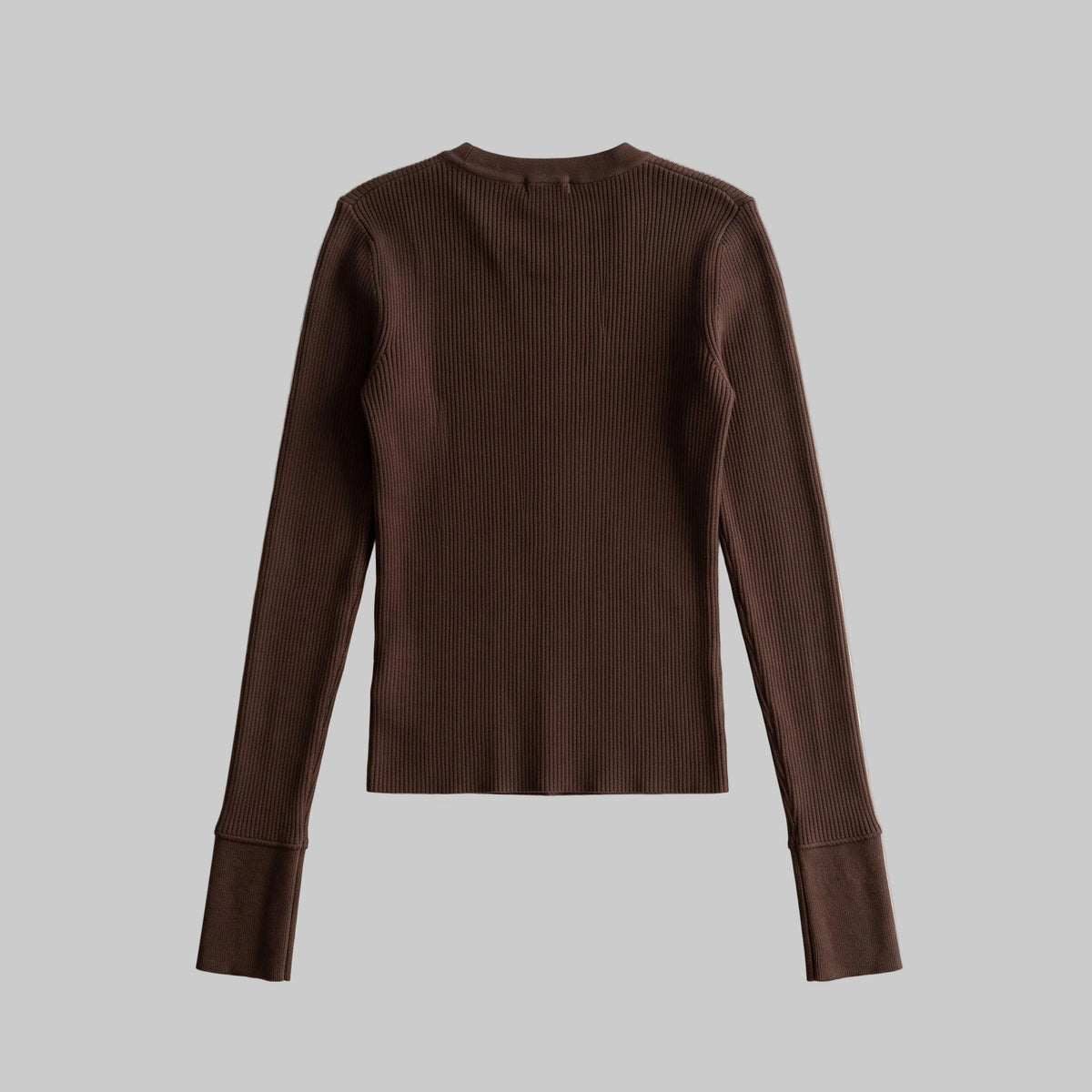 Model wearing the Sienna chocolate brown asymmetric button knit top