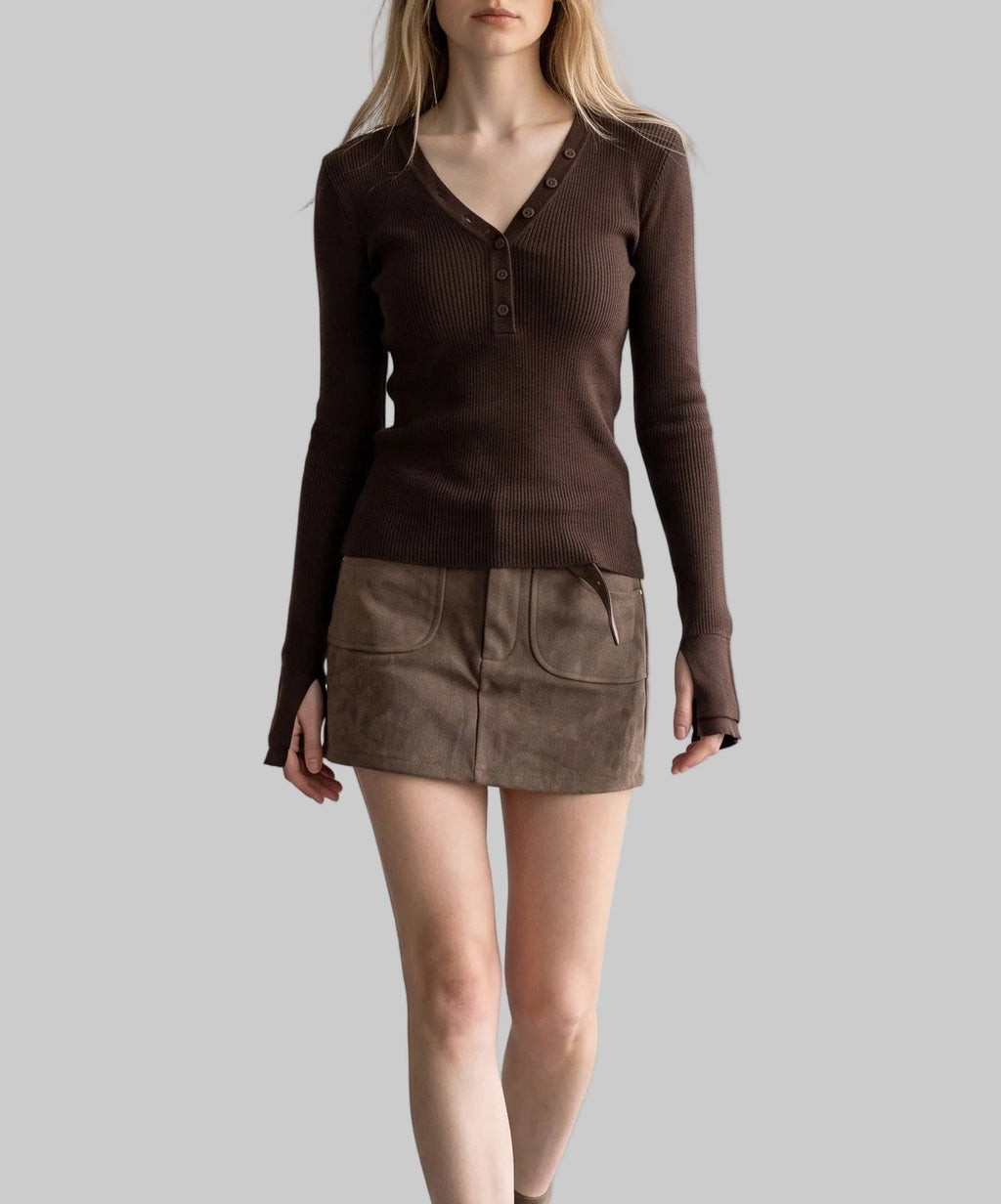 Model wearing the Sienna chocolate brown asymmetric button knit top