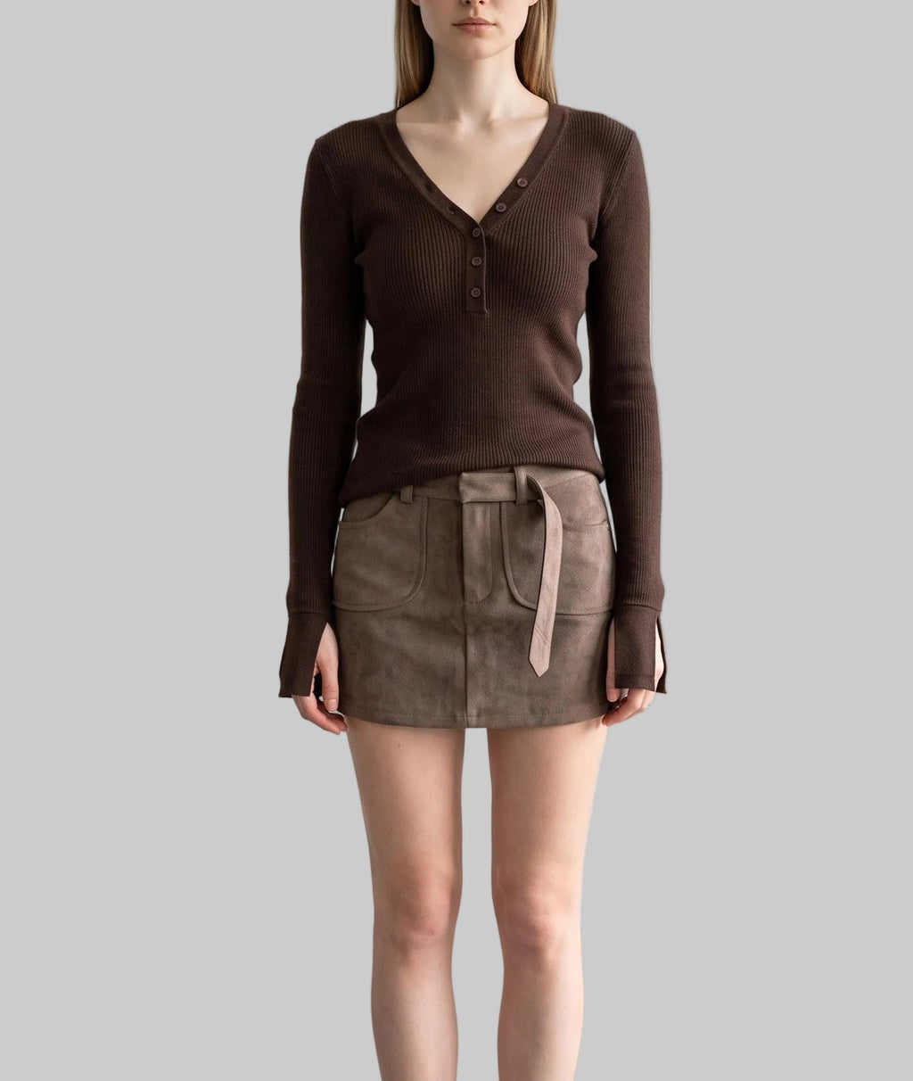 Model wearing the Sienna chocolate brown asymmetric button knit top